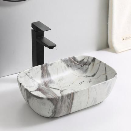 Vasque Sarratella — Vasque à poser effet marbre blanc veiné.
