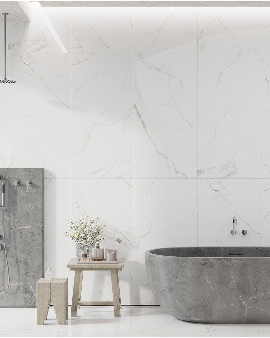 Earth — Marbre gris grand format, veine douce et finition brillante.