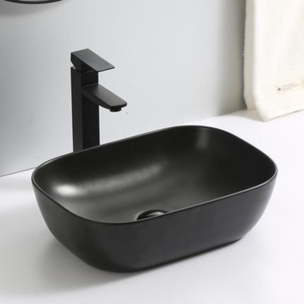 Lavabo Caudiel — Lavabo sobre encimera en negro mate, rectangular.